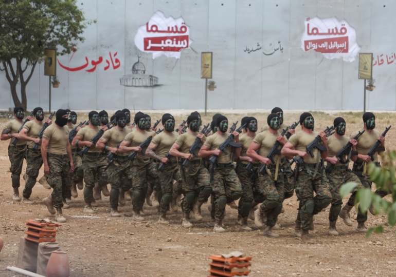 Hezbollah members take part in a military exercise during a media tour organized for the occasion of Resistance and Liberation Day, in Aaramta, Lebanon May 21, 2023. REUTERS/Aziz Taher