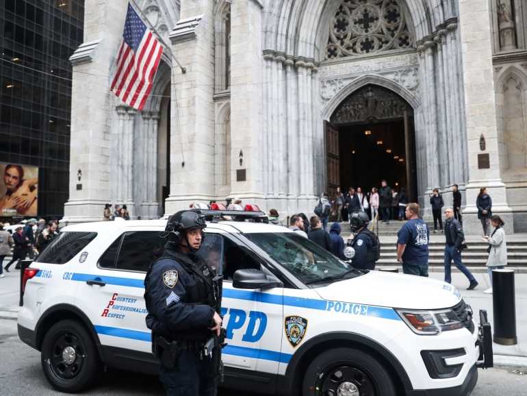 Saint Patrick's Cathedral security measures- - NEW YORK, USA - APRIL 18: NYPD officers take security measures in front of the St. Patrick's Cathedral the morning after a man was arrested after trying to enter the Cathedral with gas cans on April 18, 2019 in New York, United States.