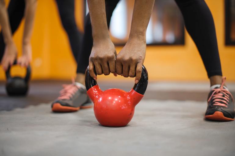 People Holding a weights