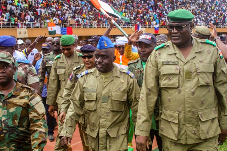 Supporters of Niger's coup leaders take part in a rally in Niamey