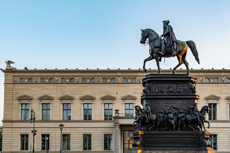 ‪ملك بروسيا فريدريك ويليم الأول Equestrian statue of King Frederick II of Prussia (Frederick the Great). Cast bronze sculpture by Christian Daniel Rauch at Unter den Linden in Berlin, Germany.‬ shutterstock_2057870180