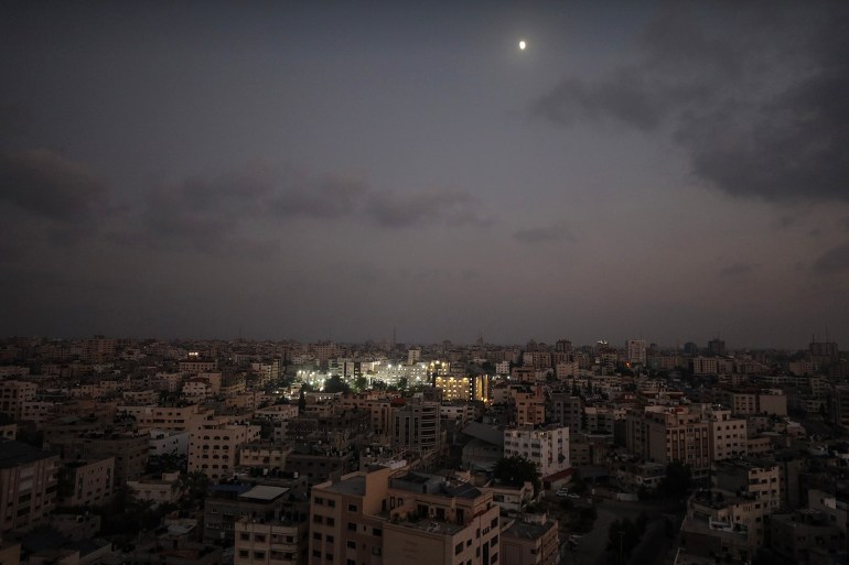 The illuminated al-Shifa Hospital. The Gaza Health Ministry warned that electric generators in hospitals will cease functioning within days because of a fuel shortage and that 32 health centers are out of service because of targeting by Israeli warplanes and a lack of fuel NOHAMMED SABER/EPAEFE/SHUTTERSTOCK