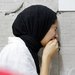 فلسطينية تبكي حزناً على شبان قُتلوا في الغارة الإسرائيلية على طولكرم اليوم الثلاثاء (رويترز)