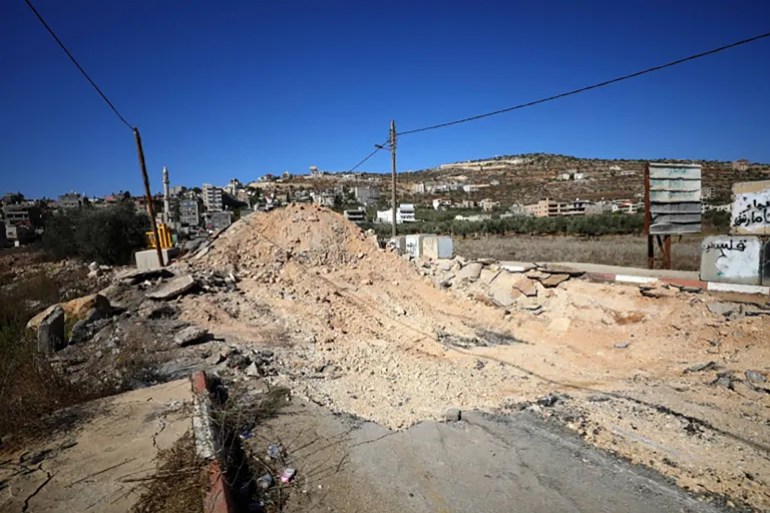 How the roads into the village have been blocked by mounds of earth and trenches by Israeli forces [Courtesy of Ayman Nobani]