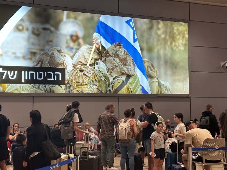 TEL AVIV, ISRAEL - OCTOBER 8: People wait in departing section at Ben Gurion Airport, Israel's only international airport, after many flights from abroad are cancelled due to the attacks launched by Palestinian factions in Tel Aviv, Israel on October 8, 2023. ( Turgut Alp Boyraz - Anadolu Agency )