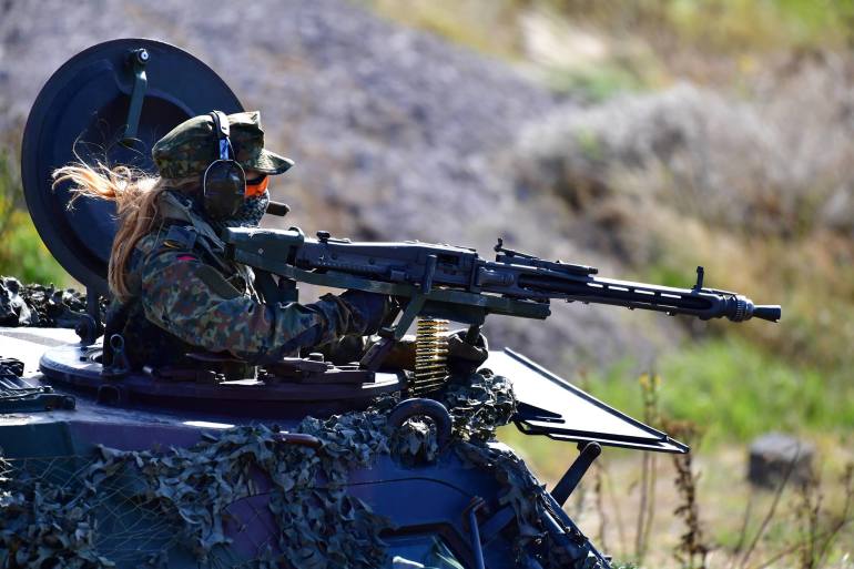 MUNSTER, GERMANY - SEPTEMBER 26: An armoured female soldier of the Bundeswehr participates in a three-day Bundeswehr exercise, which include Forces from Germany, Austria and the Netherlands on September 26, 2018 near Munster, Germany. According to media reports the German government is planning to increase defense spending by 40% to EUR 60 billion annually between 2019 and 2023. (Photo by Alexander Koerner/Getty Images)