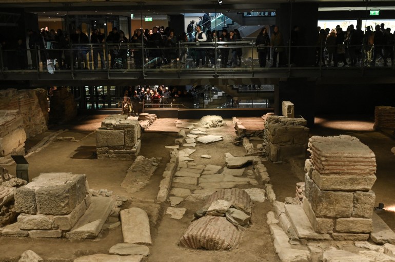 People visit the museum of the metro station Venizelou after the inauguration of the metro of Thessaloniki on November 30, 2024. - Greece's second city Thessaloniki unveil its new subway system more than a decade after the project was dogged by archaeological challenges and financial difficulties. (Photo by Sakis Mitrolidis / AFP)