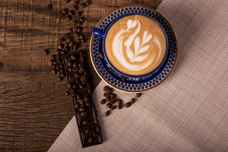 Close-Up Shot of a Cup of Coffee on a Saucer