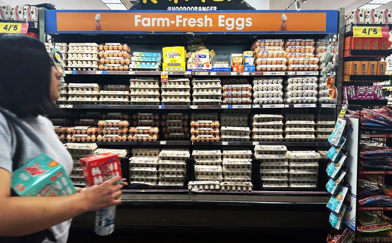 (FILES) A supermarket shopper walks past a display of eggs for sale on February 10, 2025 in Monterey Park, California. US consumer confidence in February saw its largest monthly decline since August 2021, deepening a recent slump in optimism in President Donald Trump's second month back in office. The US consumer confidence index fell 7.0 points to 98.3 in February from a revised 105.3 in January, the Conference Board announced in a statement. (Photo by Frederic J. BROWN / AFP)