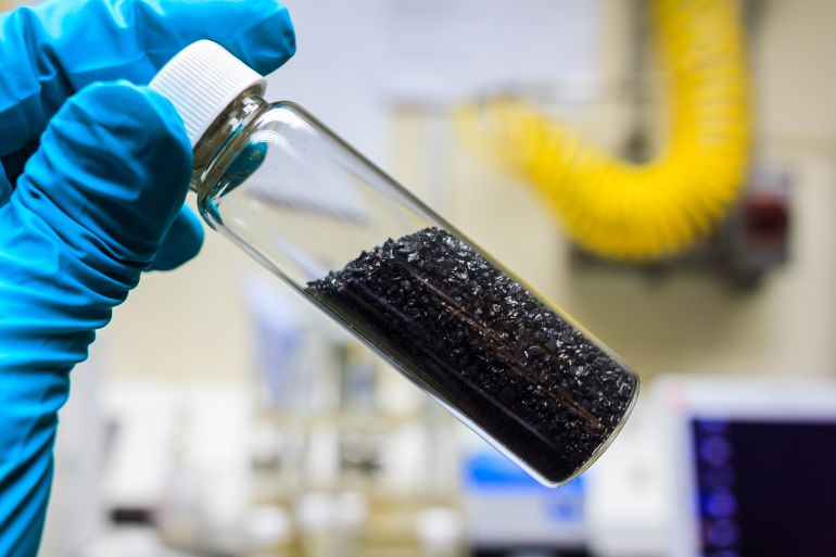 activated carbon or granular in clear bottle is used in air purification, decaffeinate, gold purification, metal extraction, water purification, medicine, sewage treatment, air filters in gas masks