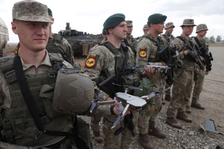 PABRADE, LITHUANIA - MAY 29: Lithuanian troops stand with their DJI drones at the Quadriga military exercises involving German, French, Dutch and Lithuanian troops during a Distinguished Visitors' Day on May 29, 2024 near Pabrade, Lithuania. Quadriga is the final part of Steadfast Defender, a series of military exercises of the NATO alliance that has been taking place mostly in northern and eastern Europe and has involved 90,000 troops with thousands of vehicles. (Photo by Sean Gallup/Getty Images)