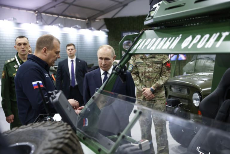 epa12220661 Russian President Vladimir Putin (R) tours an exhibition showcasing the results of the All-Russian People's Front's efforts over the past three years, held under the motto of 'Everything for Victory!' held by the All-Russian People's Front at the Russia National Centre in Moscow, Russia, 06 July 2025. EPA/ARTYOM GEODAKYAN / SPUTNIK / KREMLIN POOL MANDATORY CREDIT