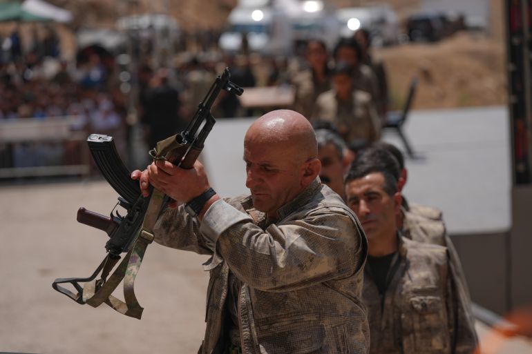 SULAYMANIYAH, IRAQ - JULY 11: The first group of PKK terrorists, (listed as a terrorist organization by Turkiye, the U.S. and the EU), lays down and destroys their weapons in Sulaymaniyah, northern Iraq on July 11, 2025. In May, the terror group PKK, decided to dissolve and lay down its arms. The announcement followed a February statement by jailed PKK ringleader Abdullah Ocalan, who called for the dissolution of the PKK and its affiliated groups, urging an end to the armed campaign that has lasted more than four decades. In its 40-year terror campaign against Türkiye, the PKK – listed as a terrorist organization by Türkiye, the US, and EU – has been responsible for the deaths of over 40,000 people, including women, children, infants and the elderly. ( Stringer - Anadolu Agency )